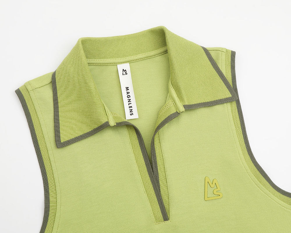 Green athletic shirt with gray accents and a brand label on a white background